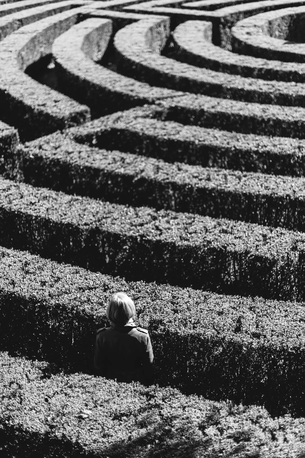 Woman inside a grass maze